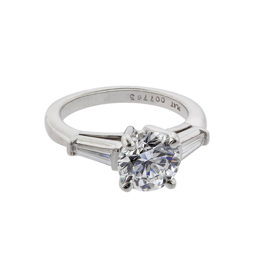 Round brilliant with sales tapered baguettes engagement ring