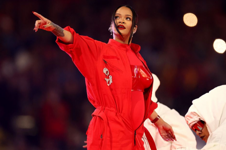 Rihanna wearing luxury vintage brooch at Super Bowl